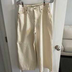 Cream colored flare crop jeans